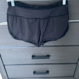 Lululemon, black with tan stripes, size 4